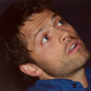 white-shirt-blue-tie-tan-coat avatar